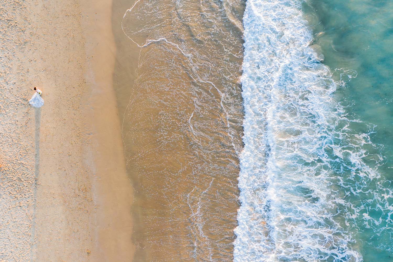 beautiful drone shot of surf beach