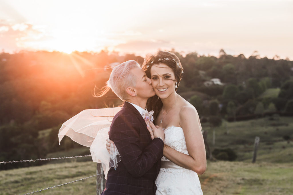 brides in beautiful sunshine coast hinterland sunset same-sex wedding