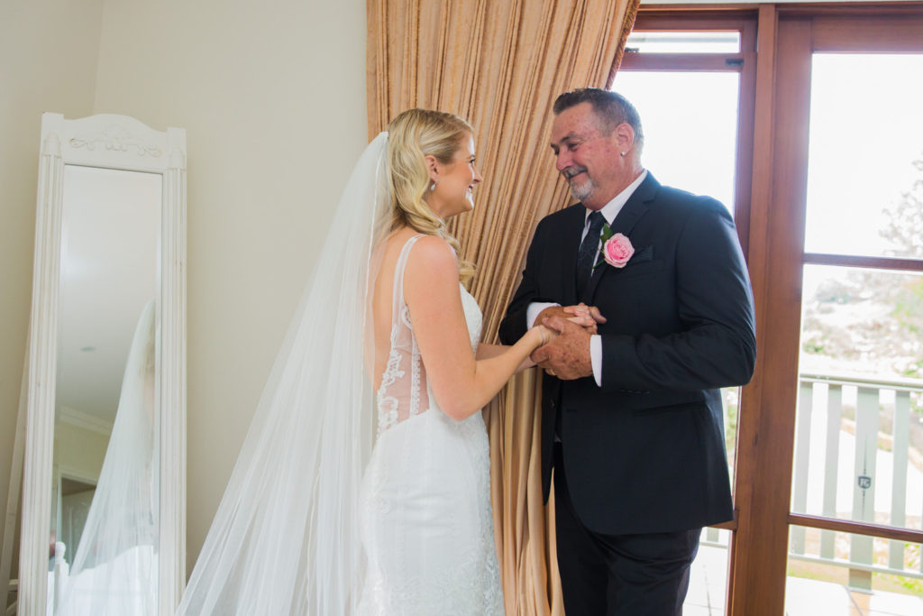 excited father of the bride prepare for wedding ceremony on sunshine coast hinterland