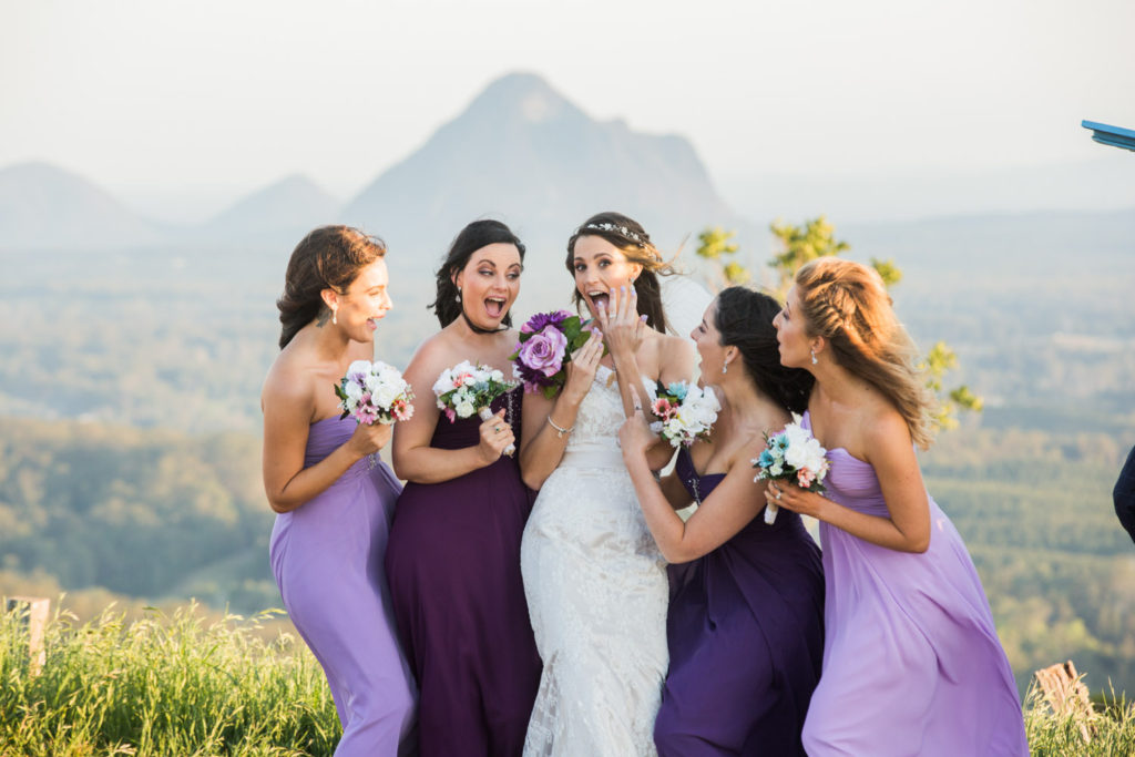 fun bridesmaids with glasshouse mountains view