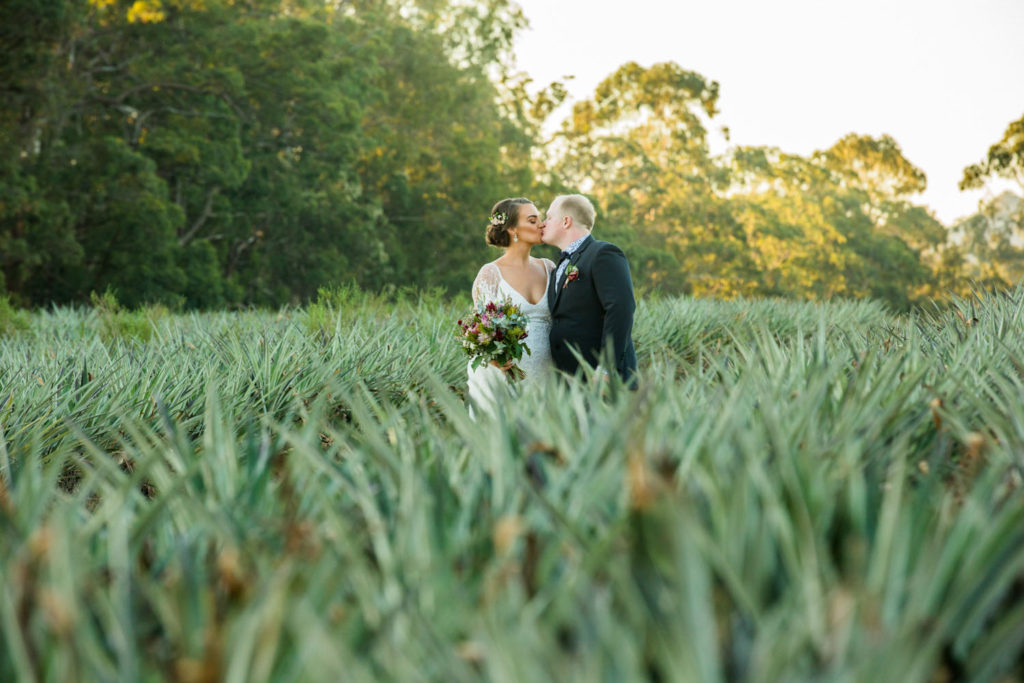 photo of bride and groom in sunset
