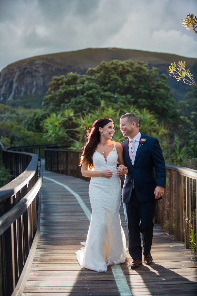 photo of bride and groom with mount coolum