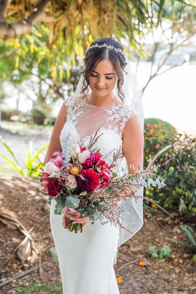 photograph of bride with native australian bouquet of flowers