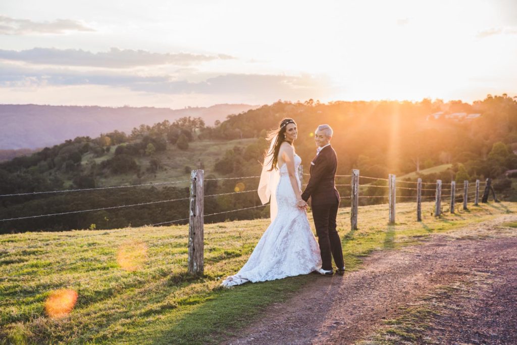 photograph of brides in sunset