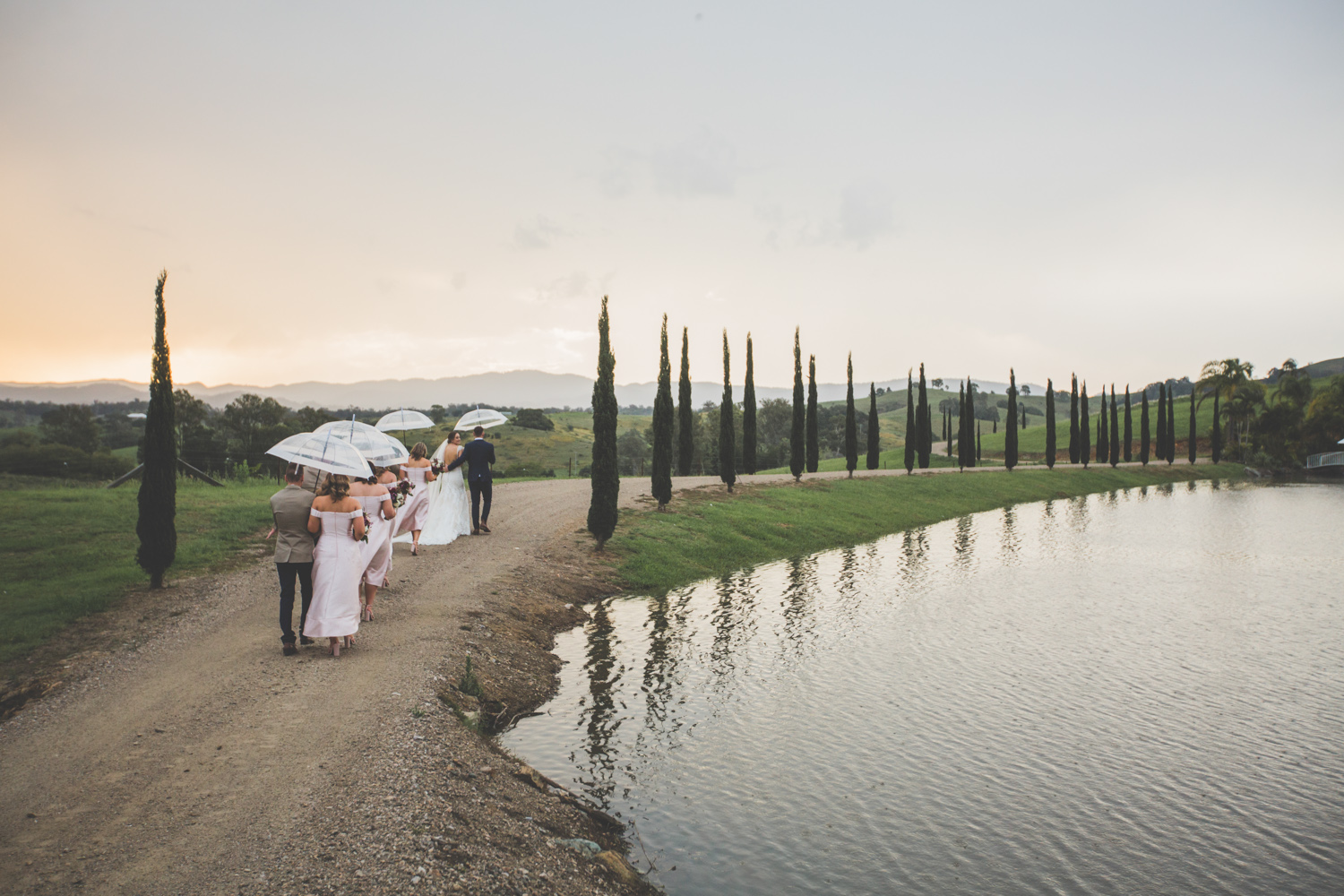 photograph of wedding party on rainy day at glengariff estate