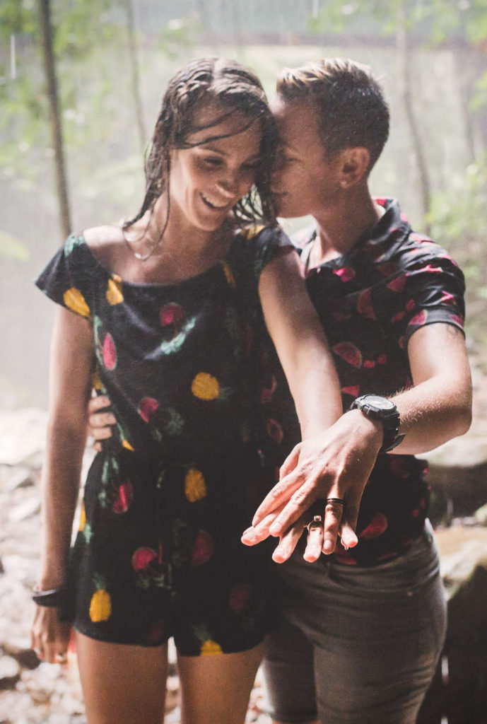 romantic engagement photograph of couple in rain